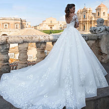 Elegant Illusion Long Sleeve Bridal Gown