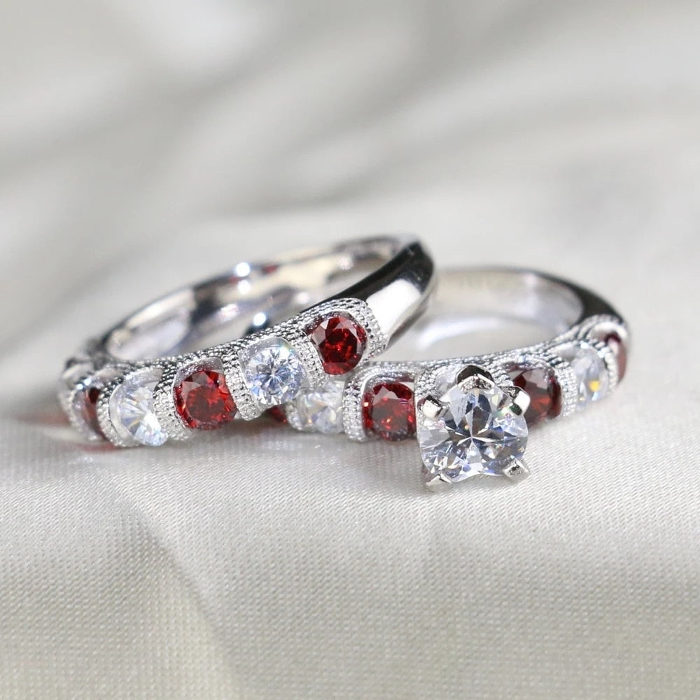 Couples Heart Garnet Stainless Steel Wedding Set